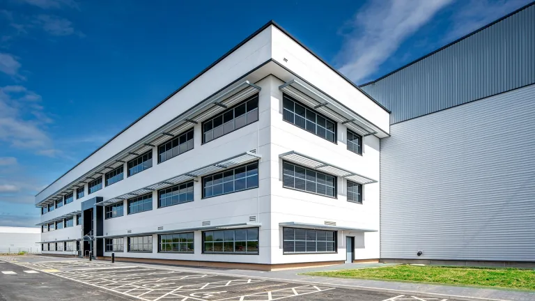 Three storey office block on the corner of the XDock 549 warehouse